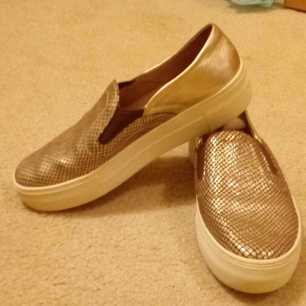 Vince Camuto Gold Metallic slip on sneakers.